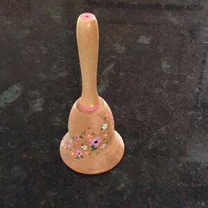 Feminine wooden bell